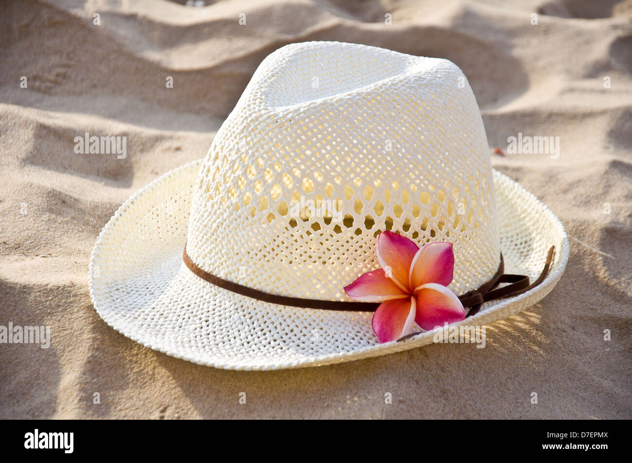 white hat on the beach for summer vacation Stock Photo