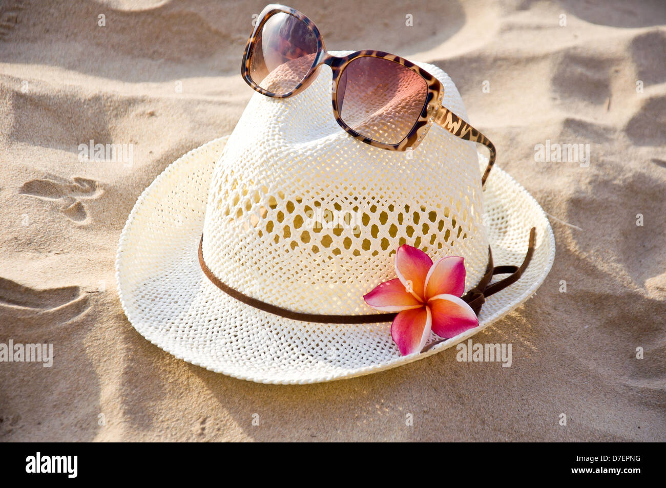 white hat on the beach for summer vacation Stock Photo