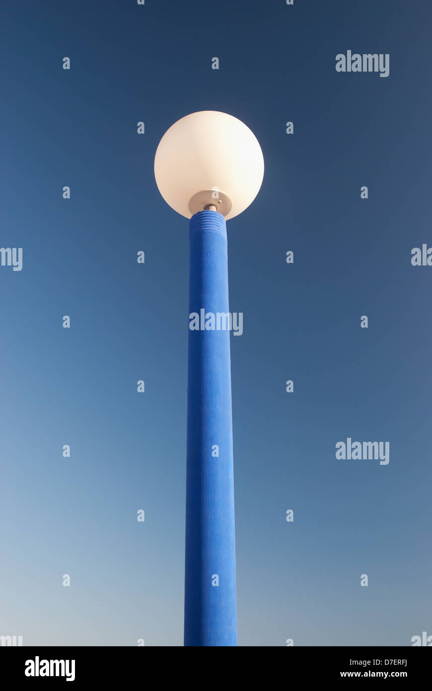 Low angle view of a lamp post against a blue sky;Malaga andalusia spain Stock Photo