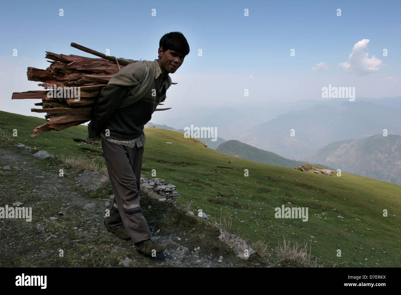 A local Garhwali man on his way home from collecting fire wood in the hills. Stock Photo