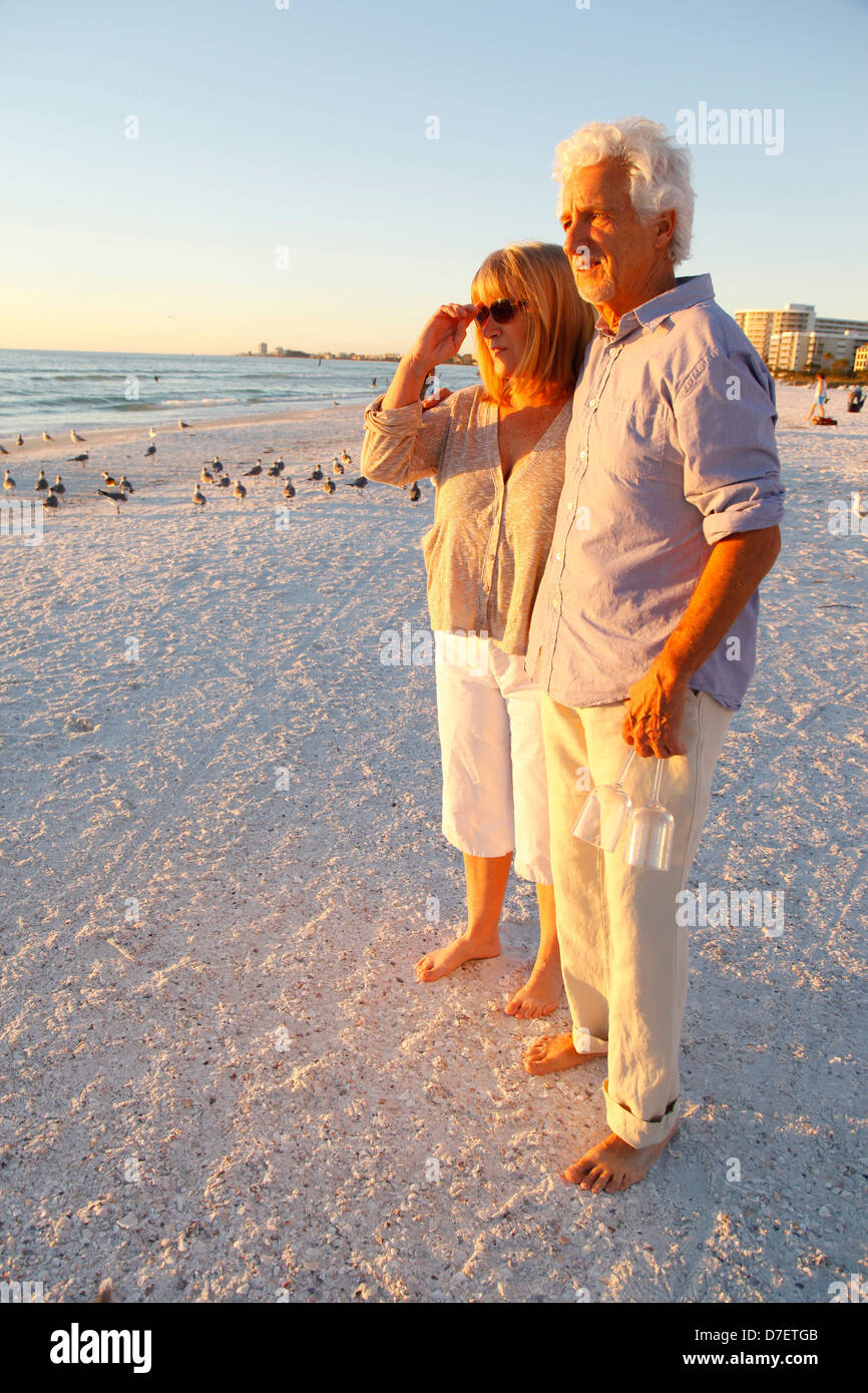 Senior man walking barefoot along hi-res stock photography and images ...