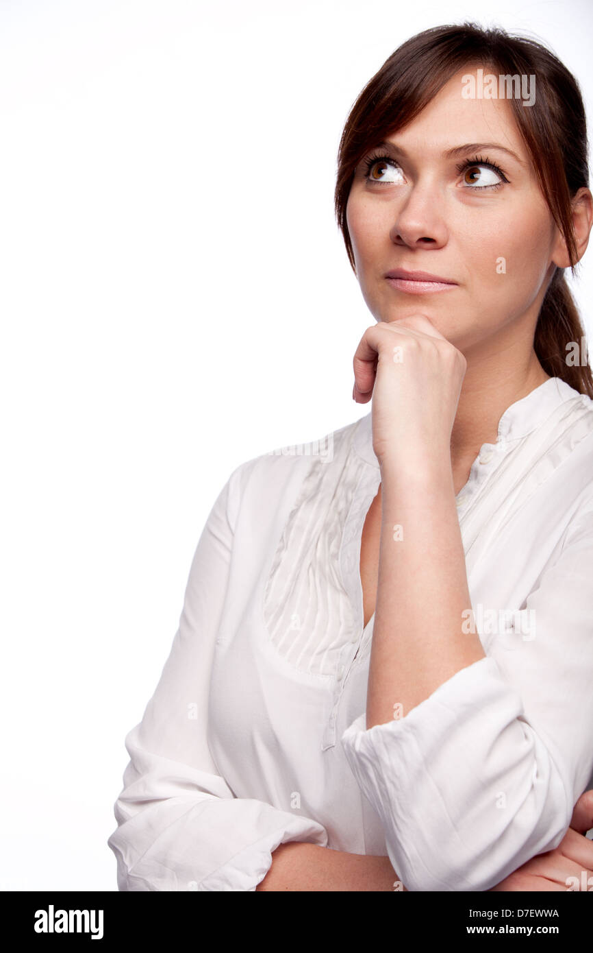 thinking woman looking up with hand on chin isolated on white Stock ...