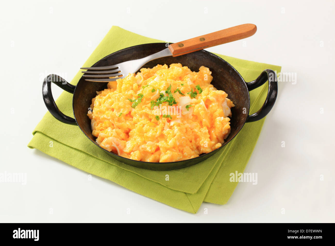 Scrambled eggs ready in a pan Stock Photo Alamy