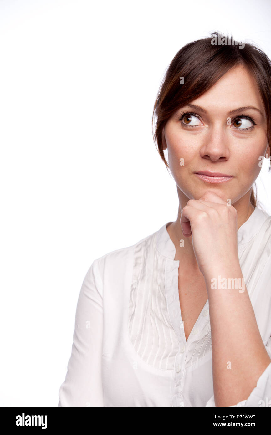 thinking woman looking up with hand on chin isolated on white Stock ...
