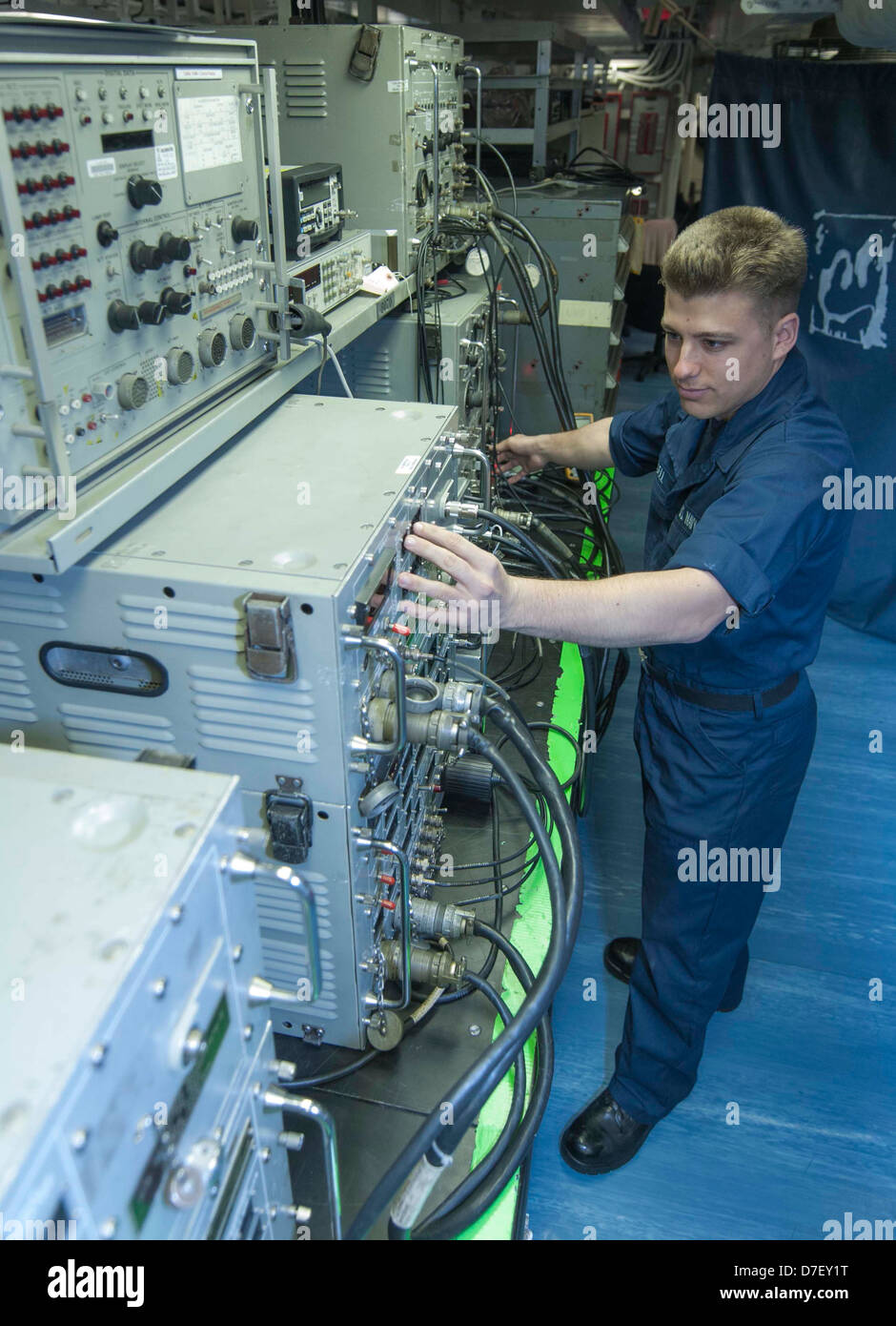 A sailor maintains avionics equipment Stock Photo Alamy