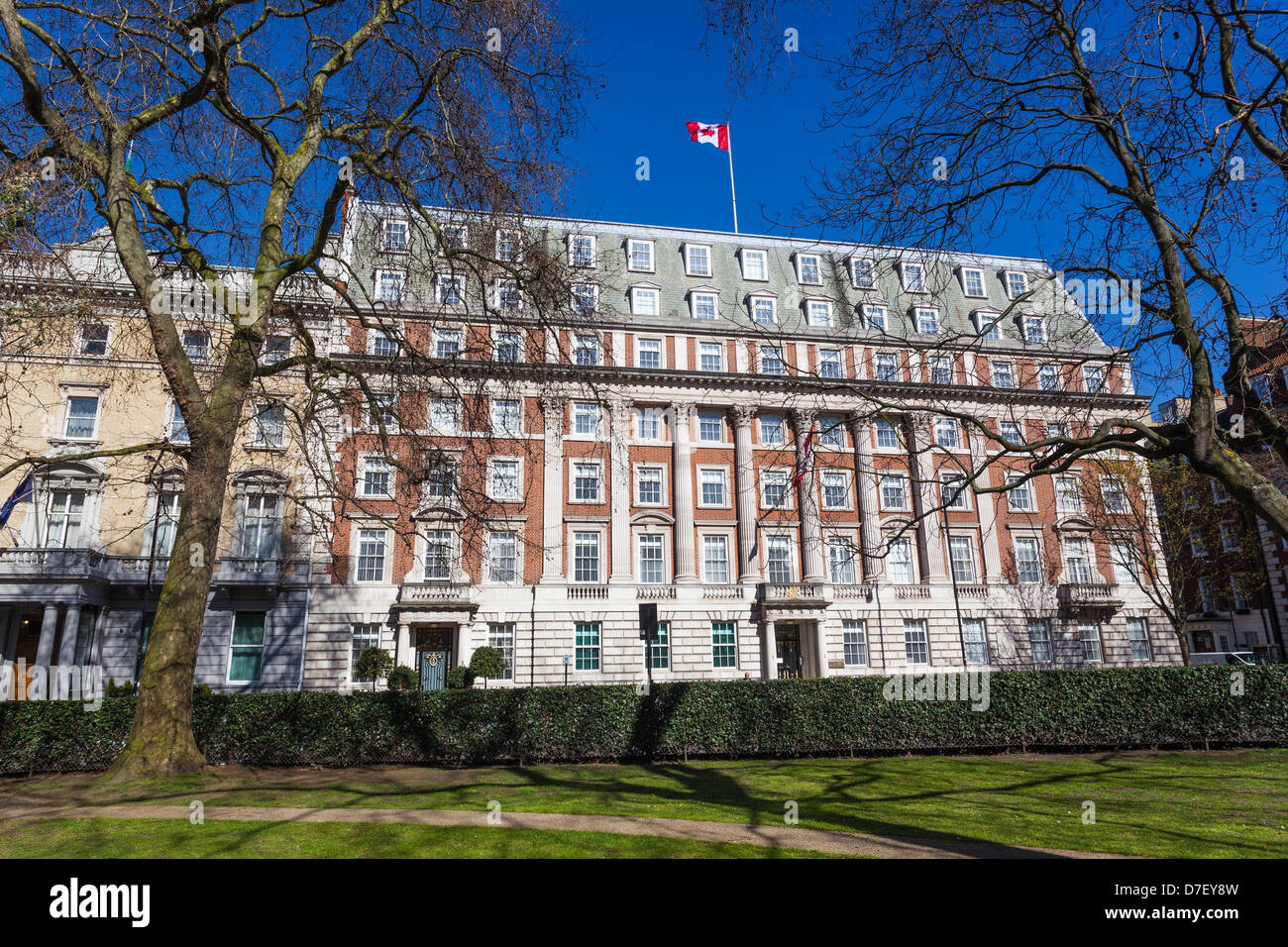 The Canadian High Commission building seen from Grosvenor Square Gardens, Mayfair, London, England, UK. Stock Photo