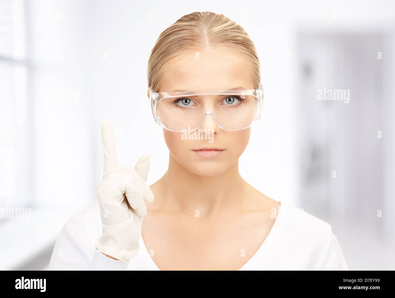 woman in protective glasses and gloves Stock Photo Alamy