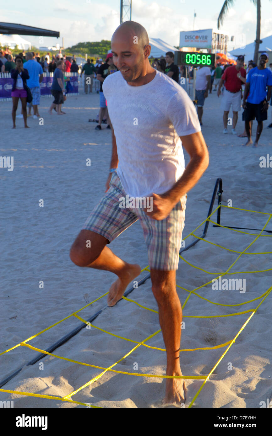 Miami Beach Florida,Lummus Park,Orange Bowl,festival,competition,fitness,timed,high stepping,man men male adult adults,FL130128017 Stock Photo
