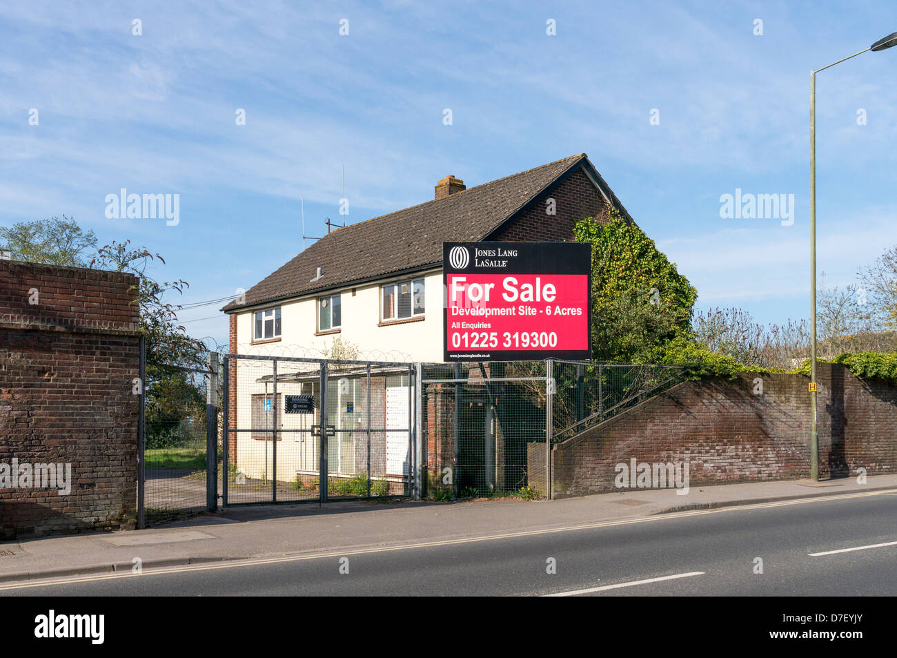 Large sign at the side of a UK road advertising a plot of land for sale for development Stock Photo