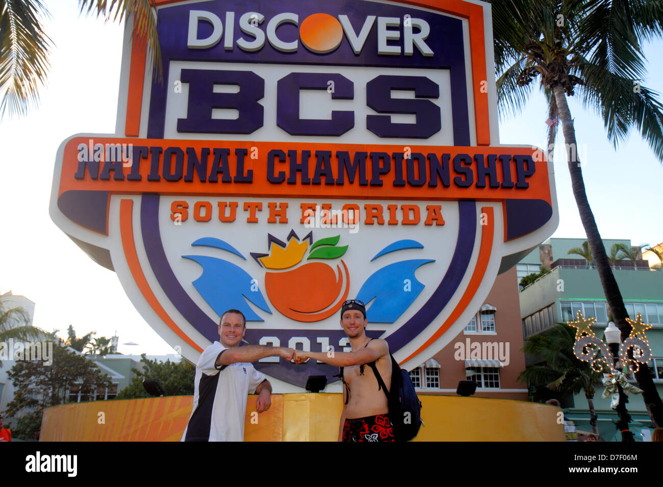 Miami Beach Florida,Ocean Drive,Lummus Park,Discover BCS National Championship,logo,sign,logo,college football,man men male adult adults,fan,posing,po Stock Photo