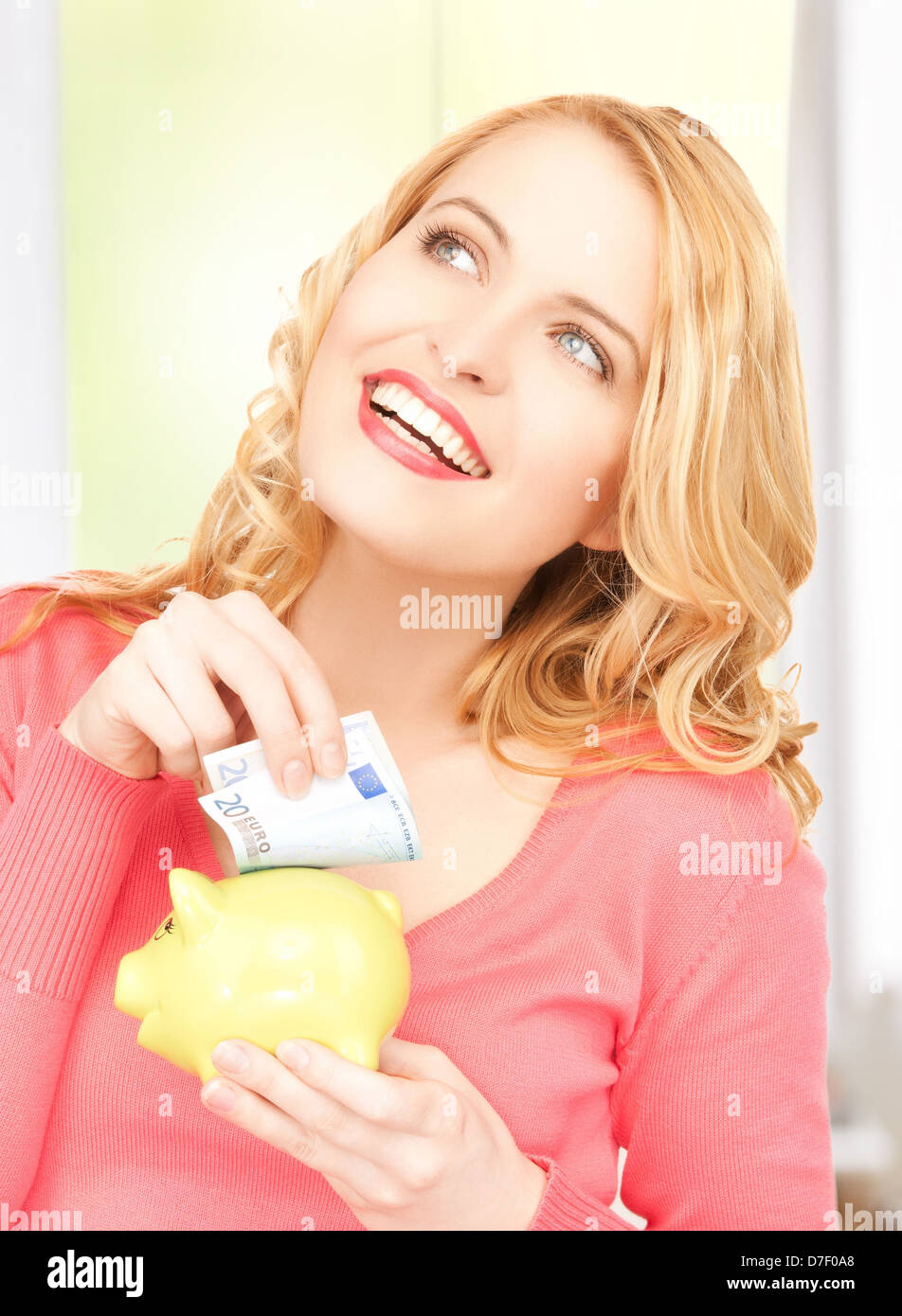 woman with piggy bank and cash money Stock Photo - Alamy