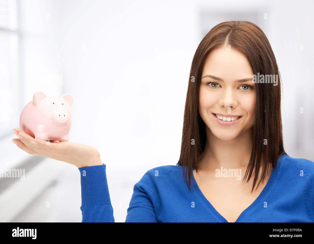 lovely woman with piggy bank Stock Photo - Alamy