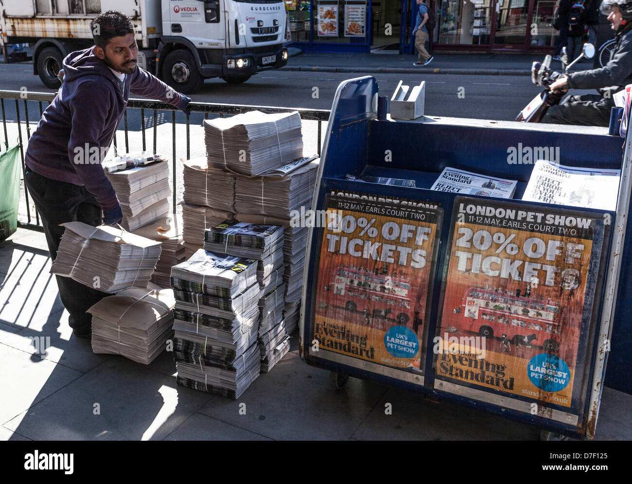Evening Standard newspaper stand on a pavement, London, England, UK Stock Photo
