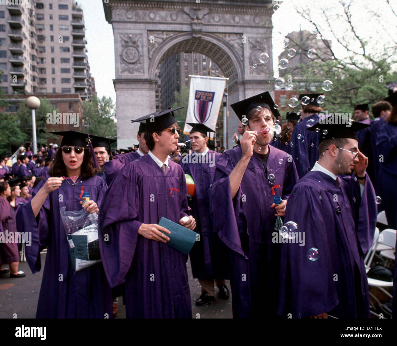 New York University graduates cavort in Washington Square Park during