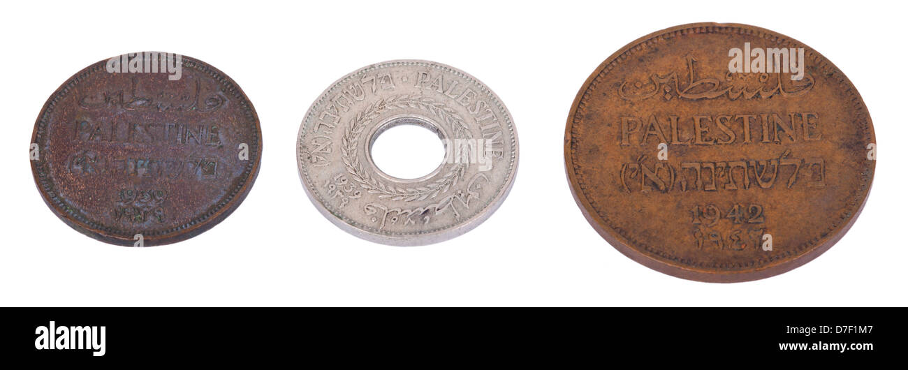 Three vintage coins from pre-Israel Palestine (1930's) called 'Mil'. From left to right - 1 Mils 5 Mils 2 Mils. Isolated on Stock Photo