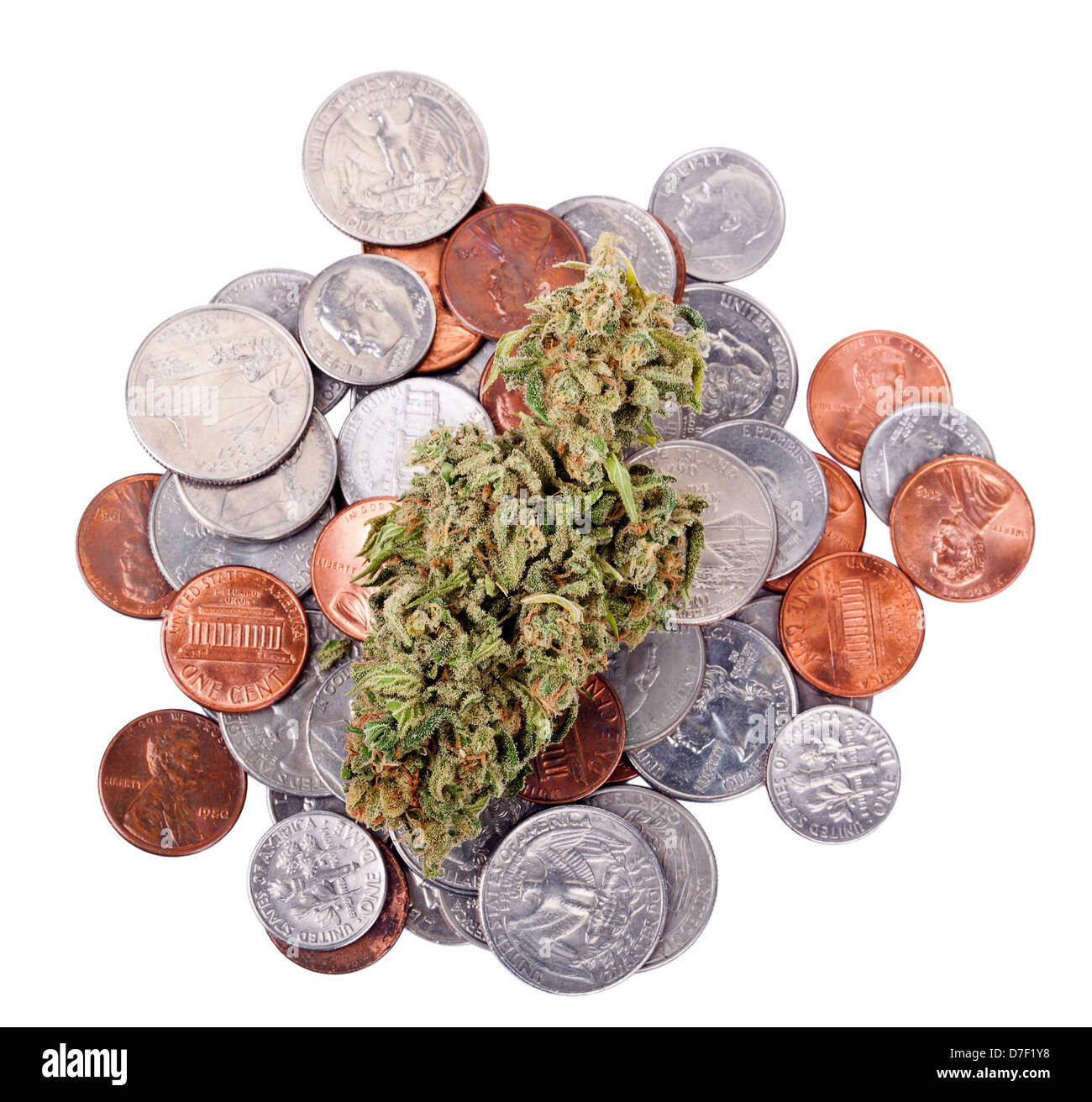 A high grade hydrophonic Cannabis (Marijuana) bud resting on pile various USA coins - pennies quarters dimes nickels. White Stock Photo