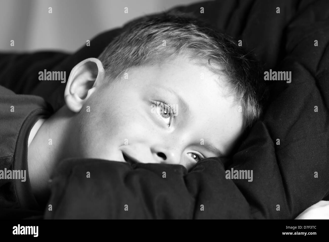 little boy with a look of hope Stock Photo