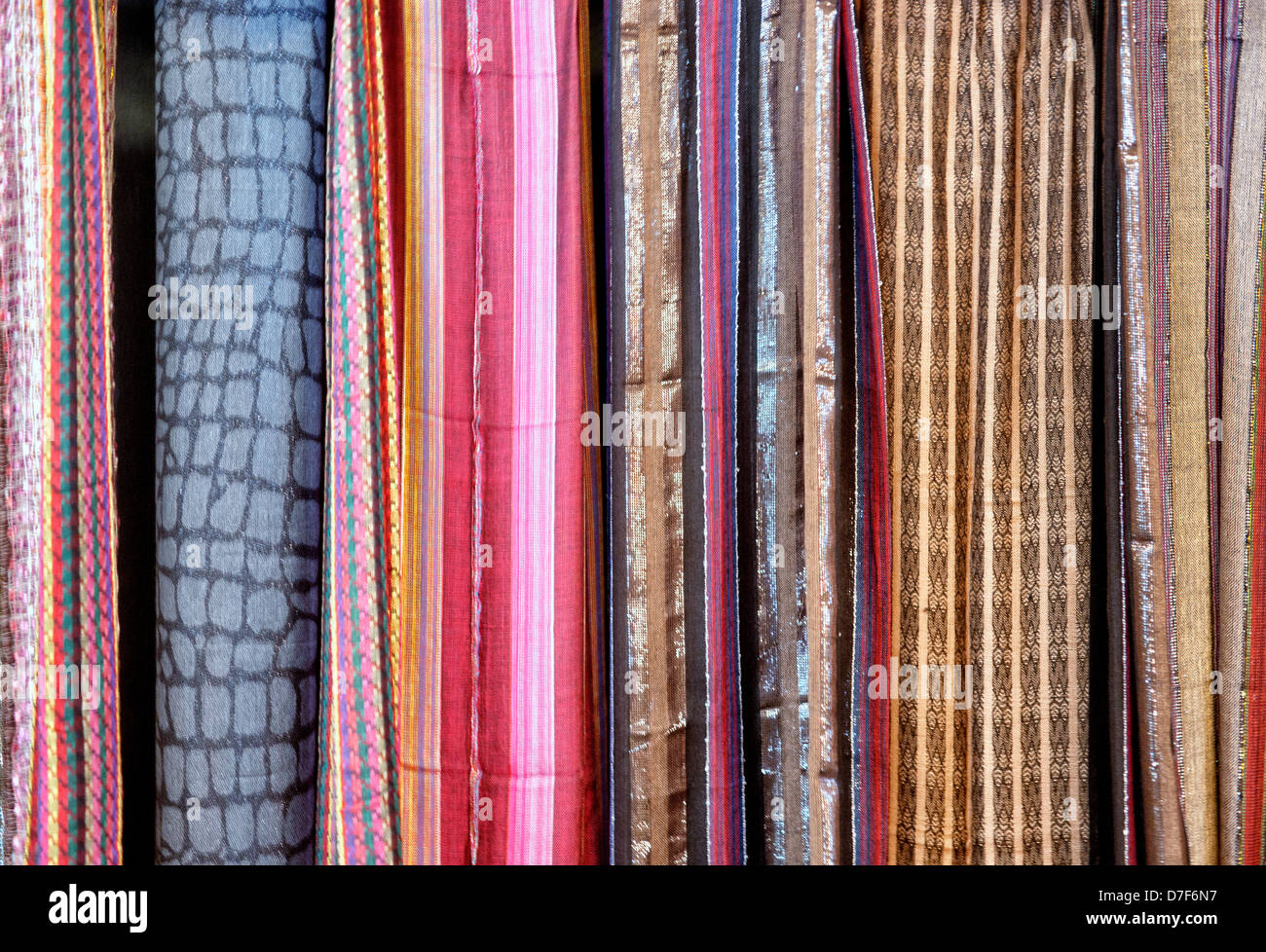 rolls of fabric for sale background texture Stock Photo
