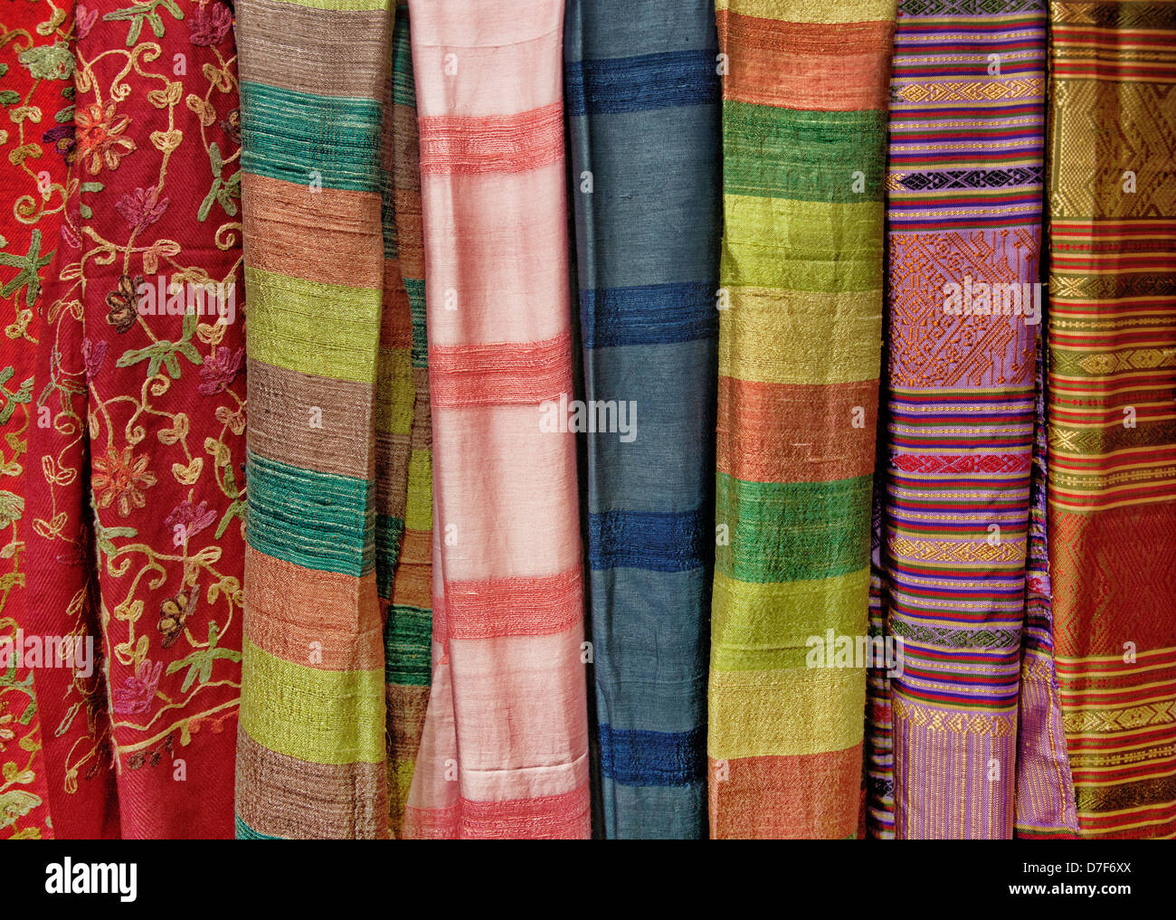 rolls of fabric for sale background texture Stock Photo