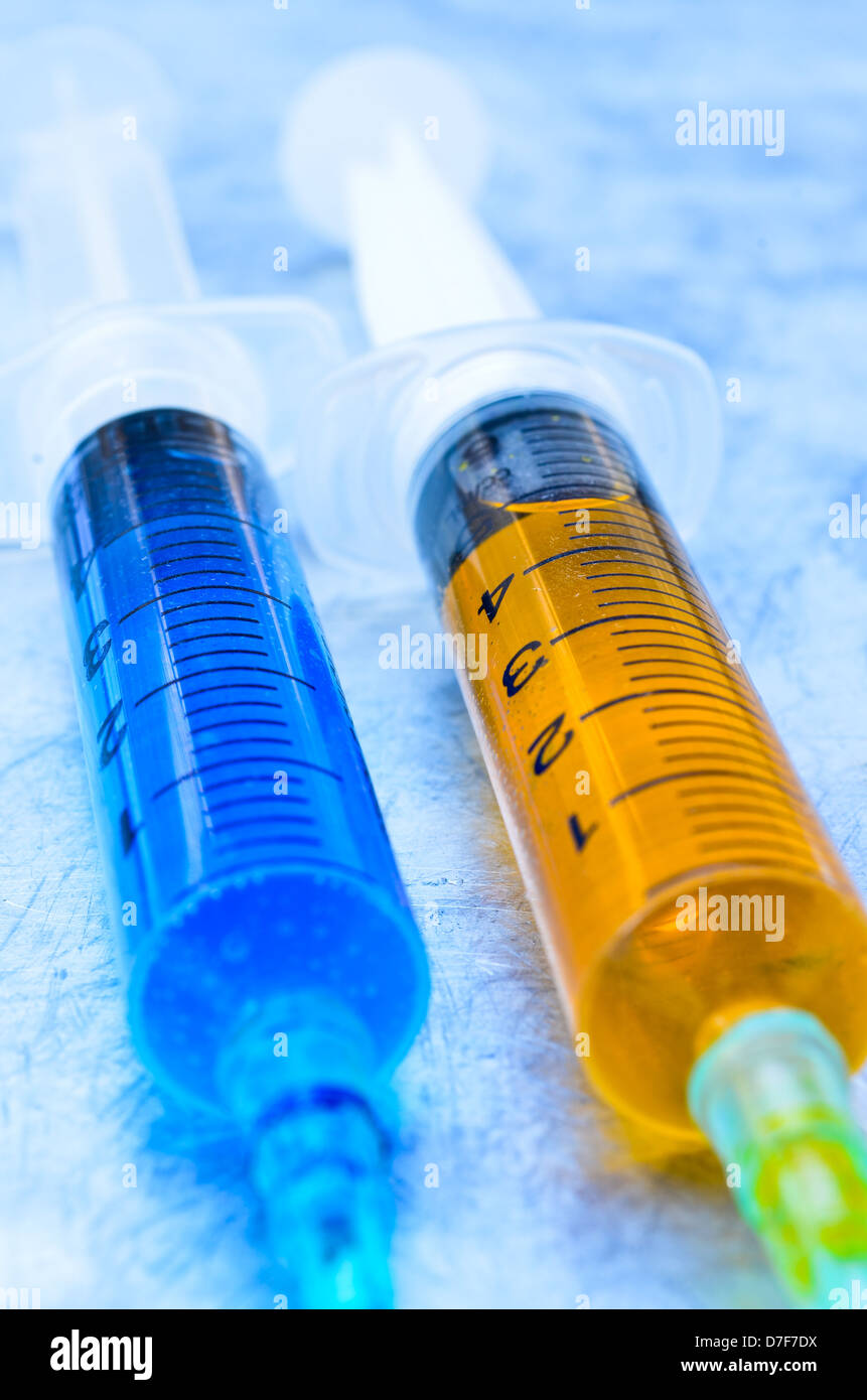 Large vaccination syringe injecting hi-res stock photography and images ...