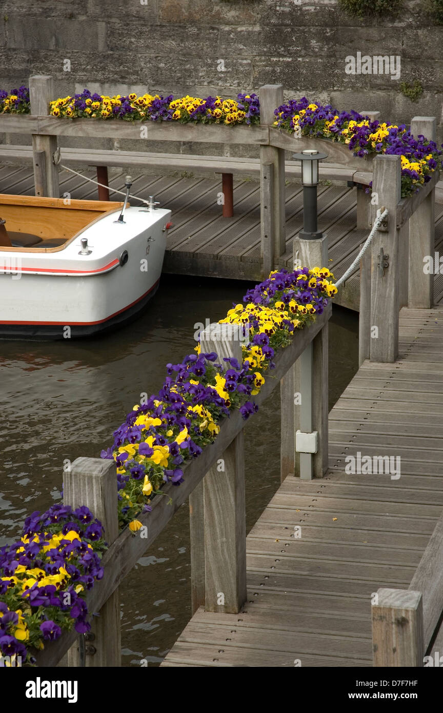 Empty pleasure boats for tourists on the Djiver Canal Brugge, Bruges, Belgium Stock Photo