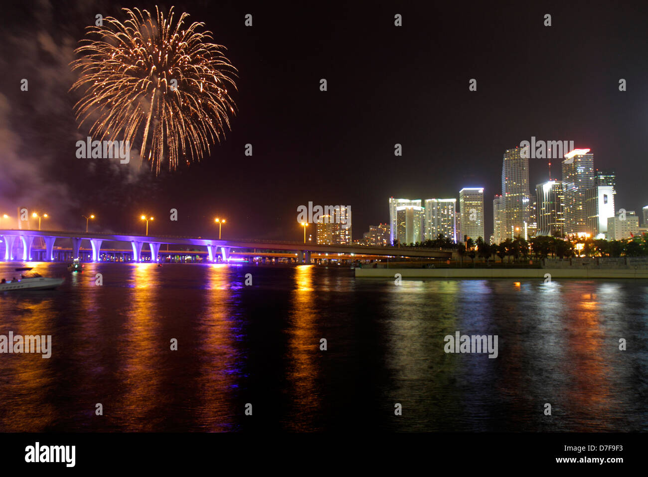 Miami Florida,Government Cut,Biscayne Bay water night,downtown city skyline Port Boulevard Bridge,July Fourth 4th,celebration,fireworks,burst,reflecti Stock Photo