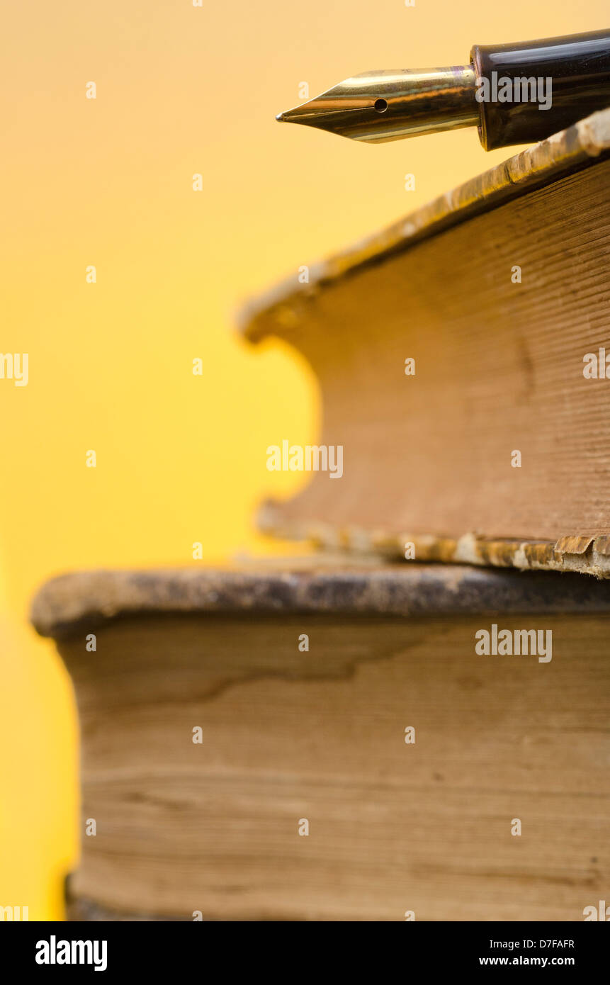 Old Books and fountain pen closeup Stock Photo Alamy