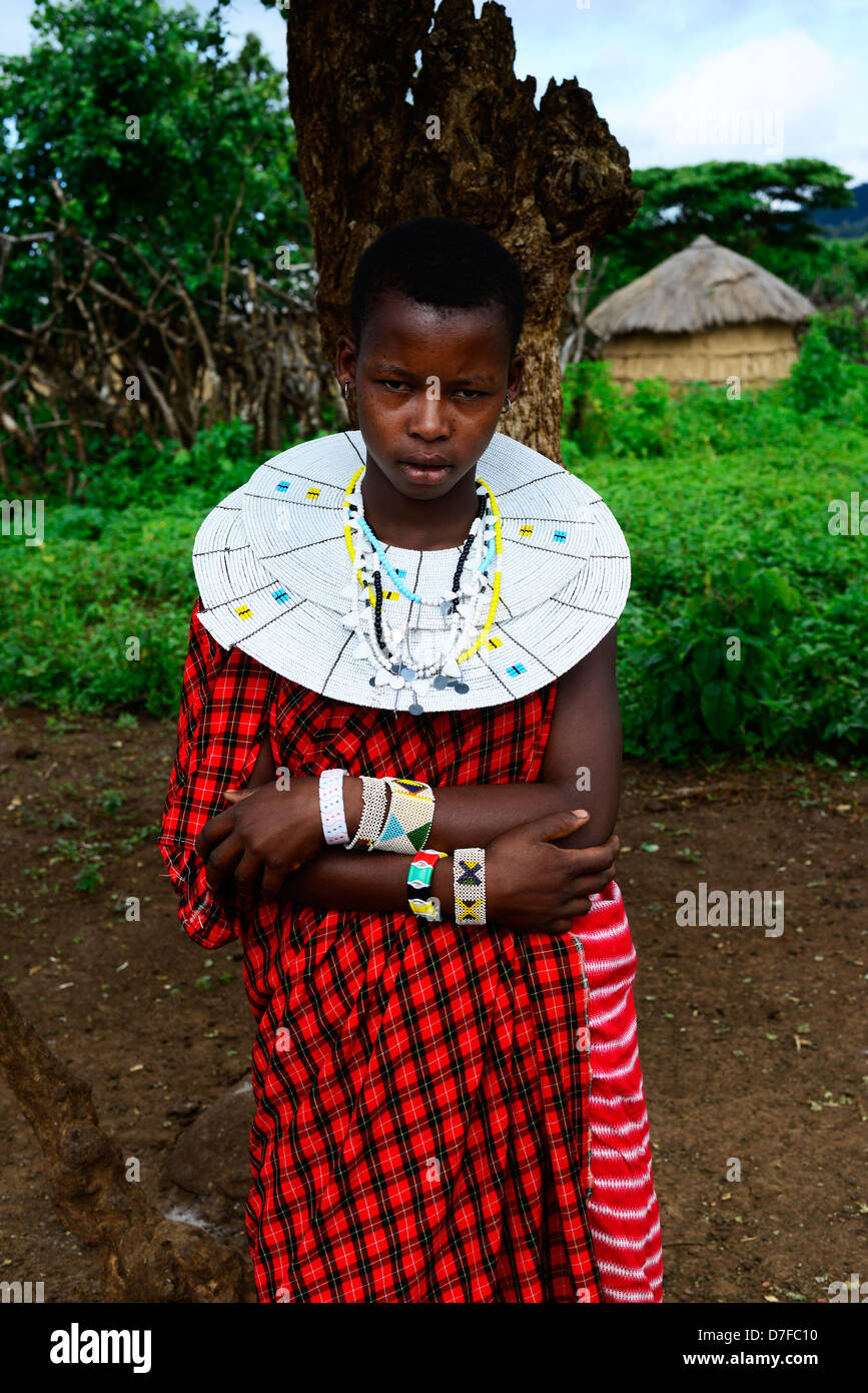 A young Masai woman wearing traditional Masai tribe beaded necklace. Stock Photo