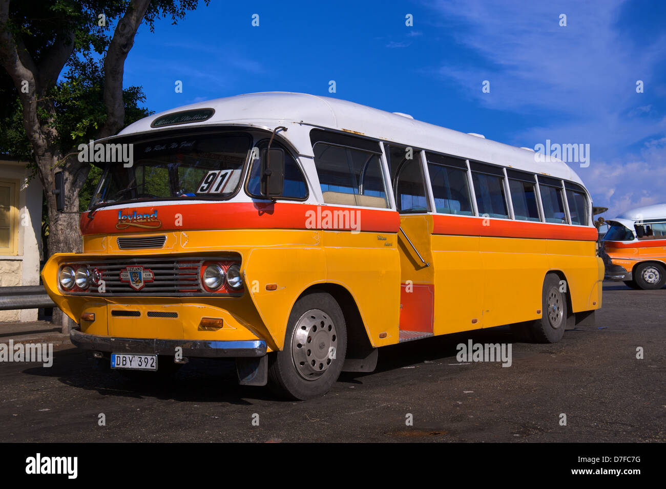 The multi colored, vintage buses on the Island of Malta, seen here in the capital, Valletta Stock Photo