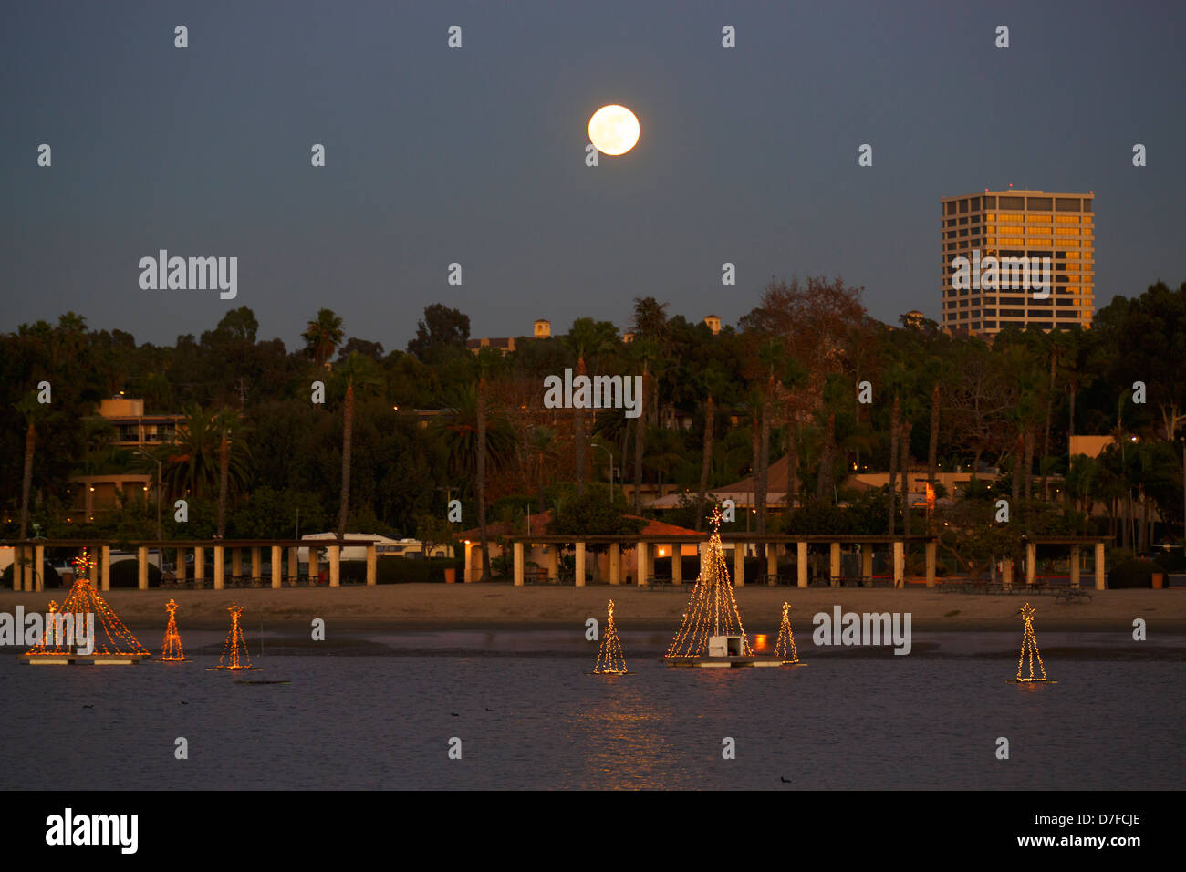 Full moon over Fashion Island from the Back Bay, Newport Beach, Orange County, California. Stock Photo