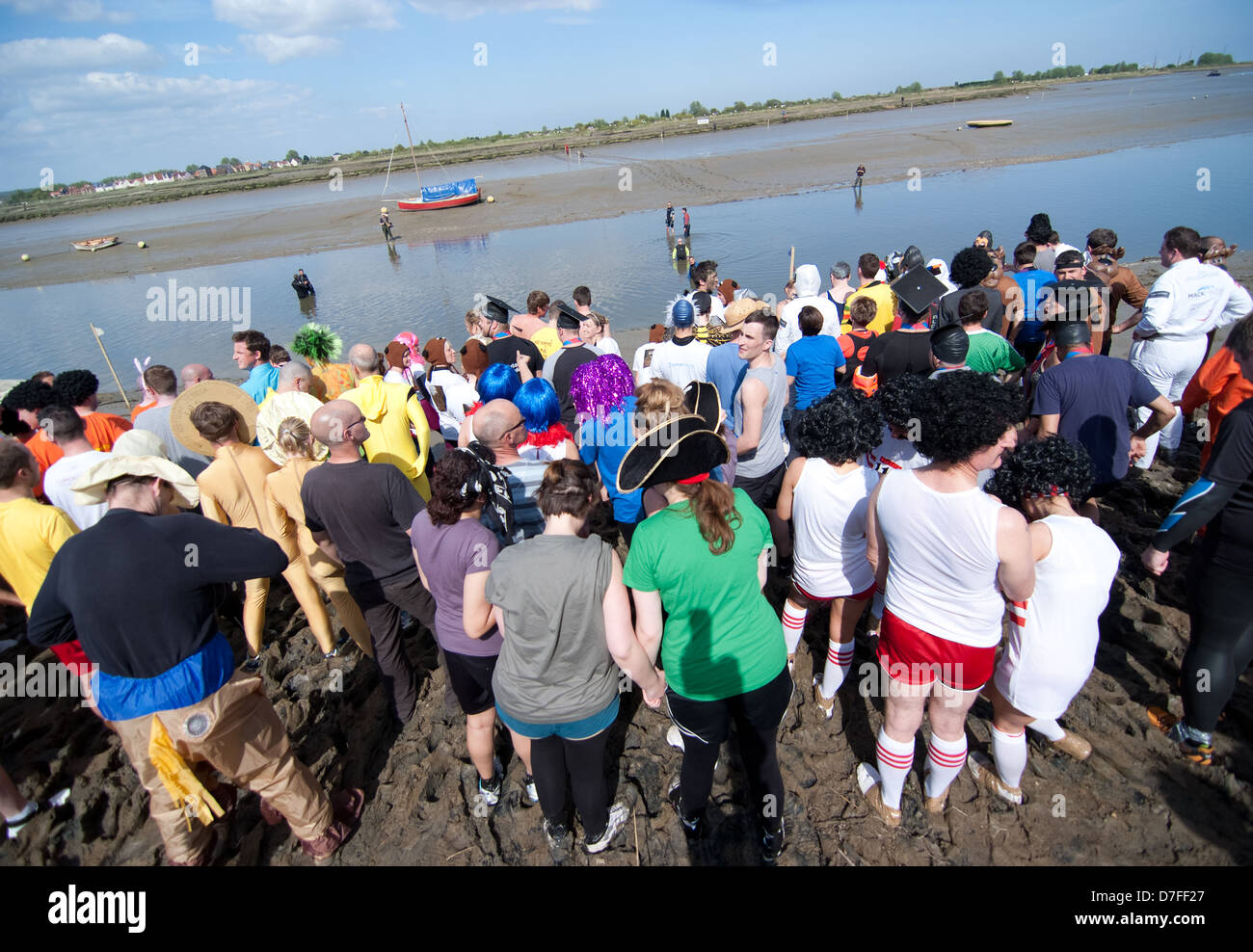 Runners at the start of the 2013 ,  maldon mud race Essex Stock Photo