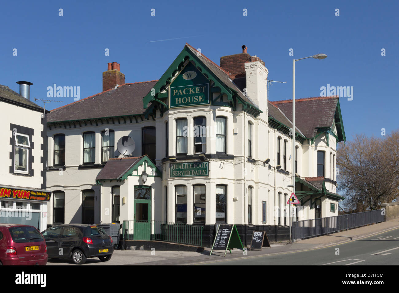 Packet House at Burscough Bridge, a large pub/restaurant at the crossing point of the Leeds-Liverpool Canal and the A59 road. Stock Photo