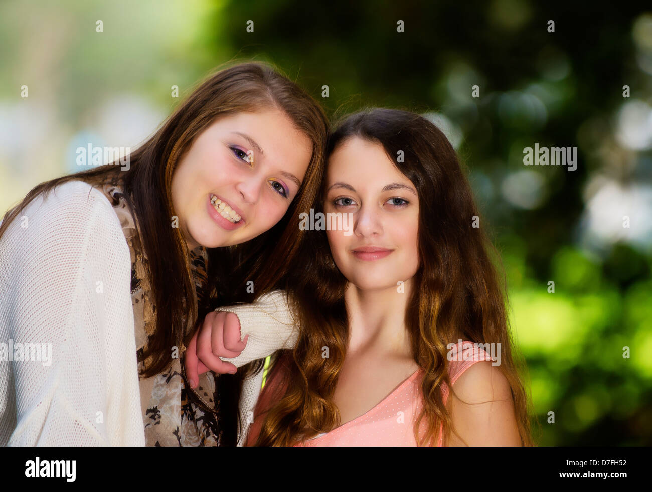 Two young girls pose for a portrait Stock Photo