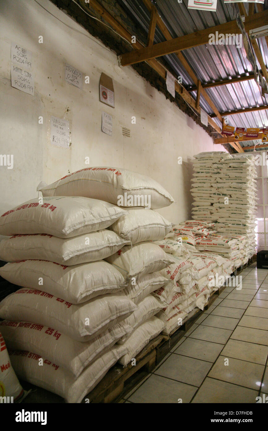 12.5Kg bags of maize meal for sale in a general dealer shop Stock Photo