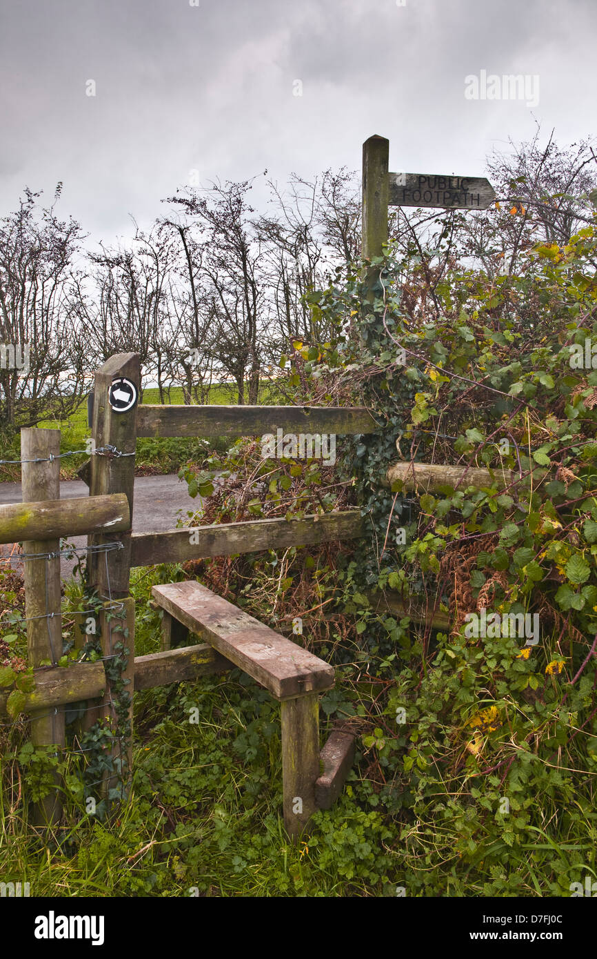 A finger post points the way for the public footpath. Stock Photo