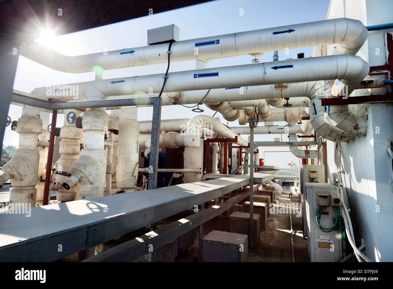 This complex pipes & valves system is located on roof an office