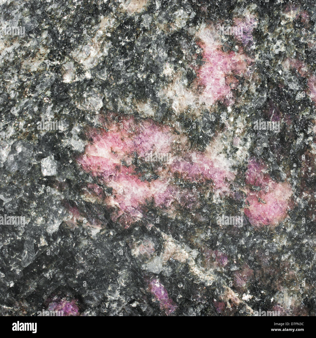 Raw rhodonite texture background Stock Photo - Alamy