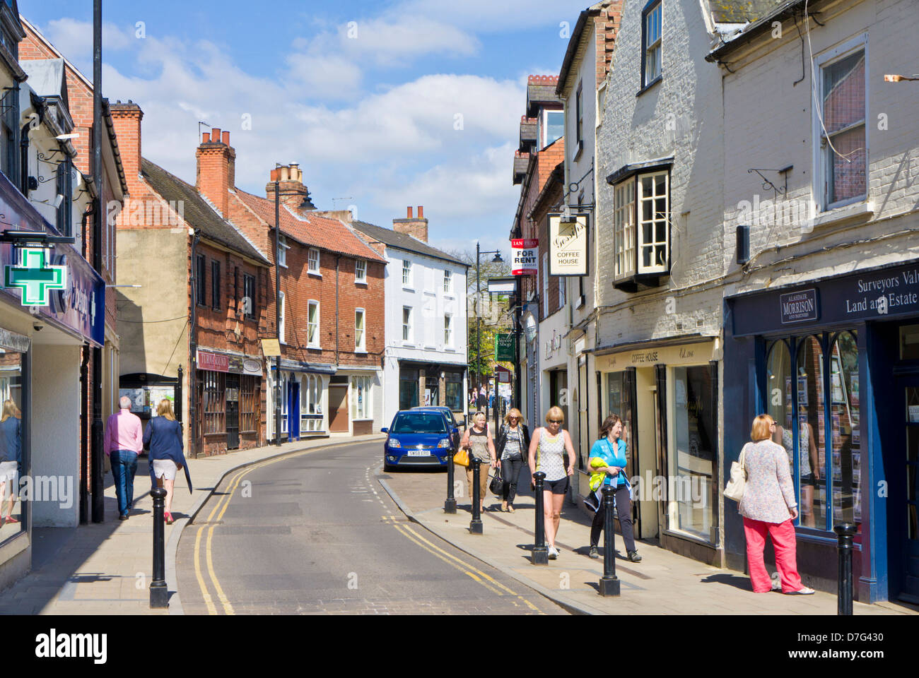 People walking and shopping on King street in the centre of the village of Southwell Nottinghamshire England UK GB EU Europe Stock Photo