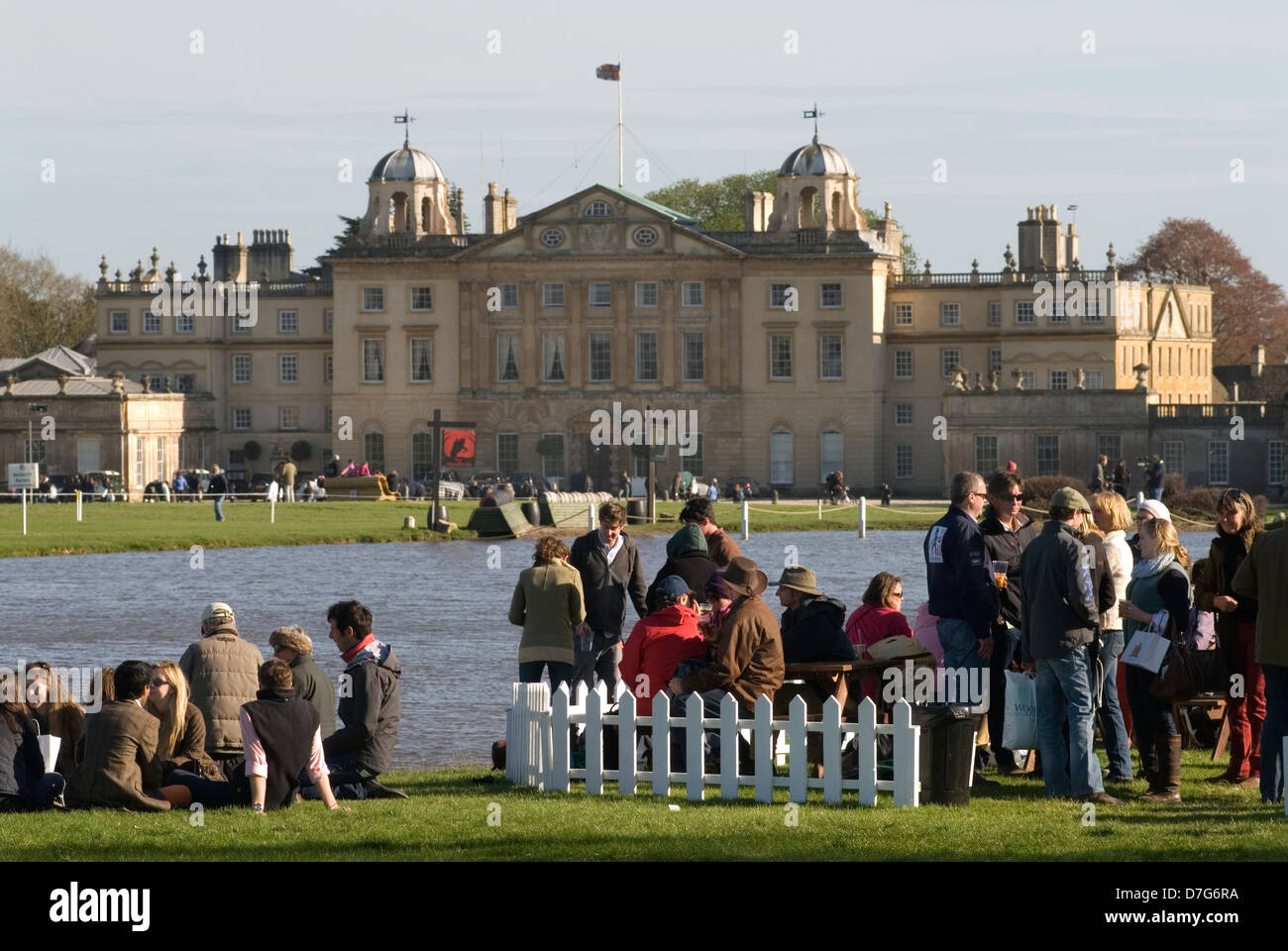 Badminton House during the Badminton Horse Trials spectators enjoy a drink at he end of the day after eventing around the Lake HOMER SYKES Stock Photo