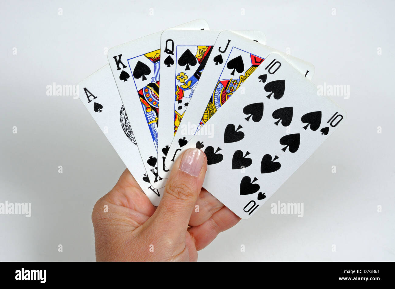 Royal flush poker hand in the spade suit against a plain background Stock Photo Alamy