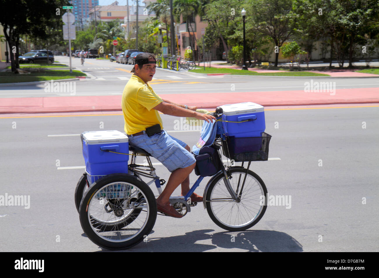 Miami Beach Florida,Alton Road,Hispanic man men male adult adults,tricycle,riding,pedaling,FL120929022 Stock Photo