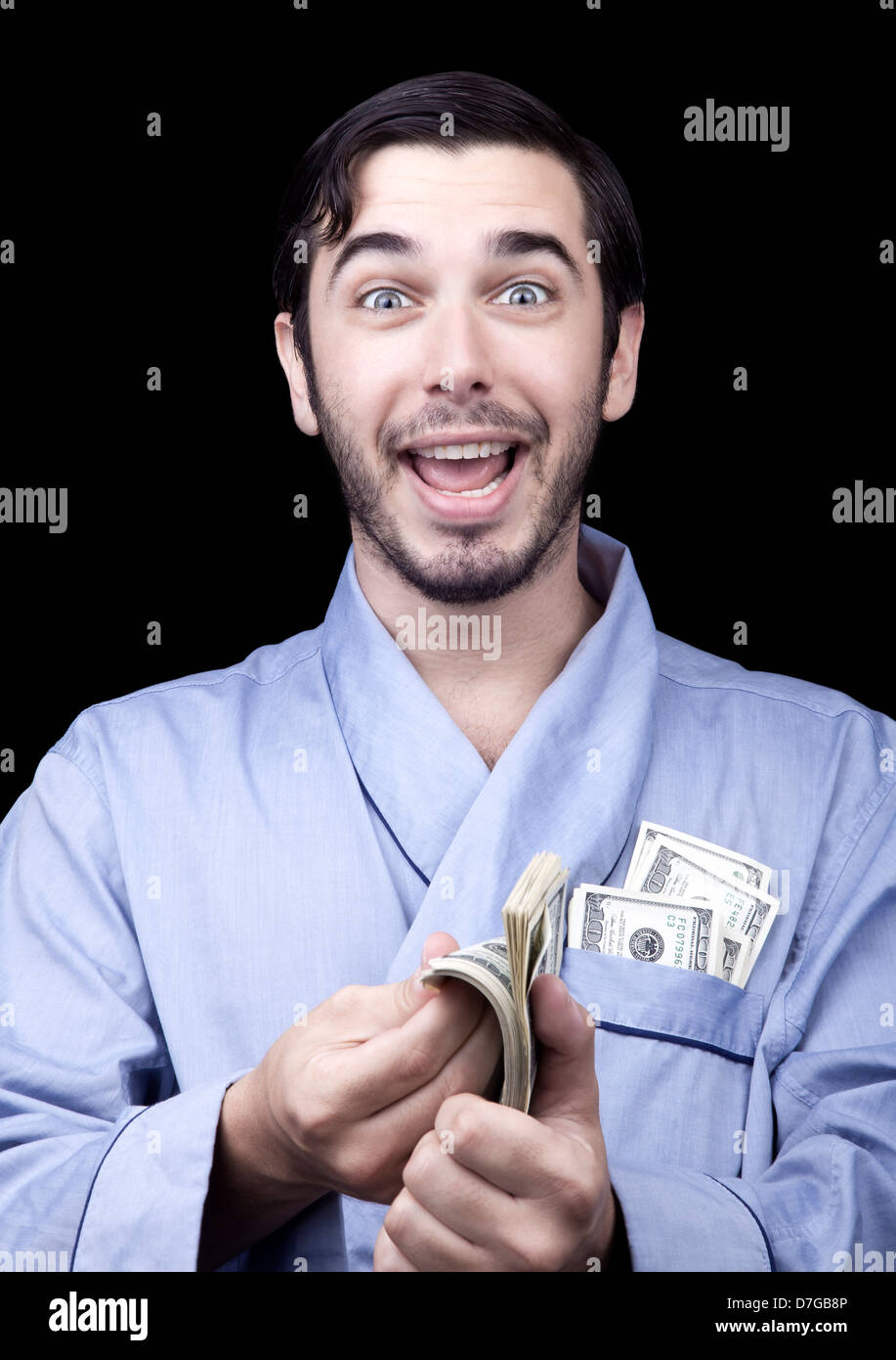 Medium closeup an adult man (30 years old). Although his hair is neatly combed he appears to be quite bum being unshaved Stock Photo