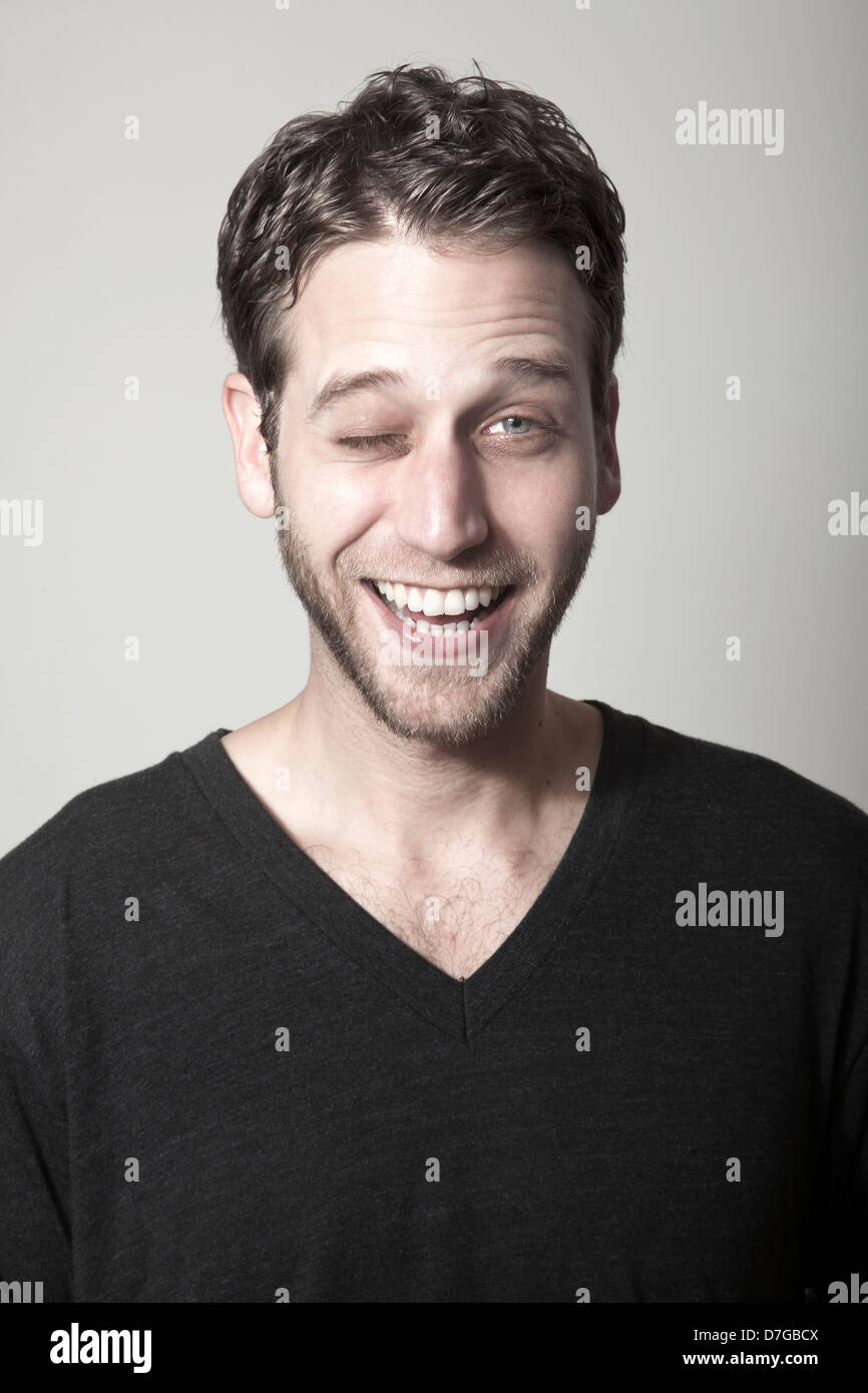 Handsome hunk winking hi-res stock photography and images - Alamy