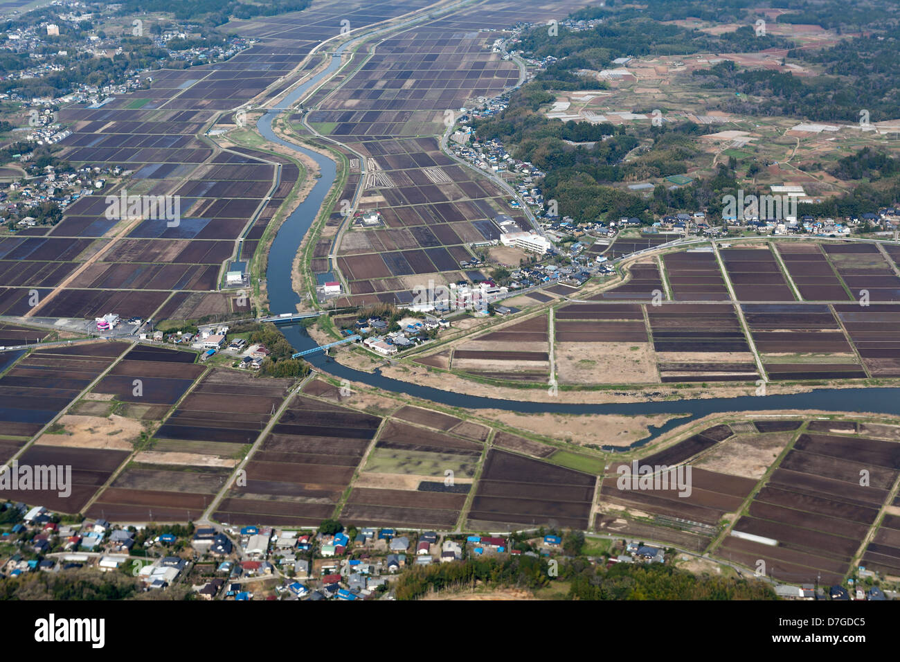 Japanese countryside aerial view with rice fields, river and small