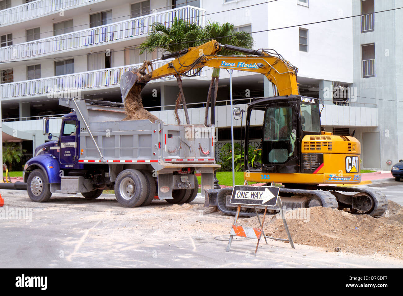 Miami Beach Florida,Ocean Drive,road repair,under new construction site building builder,capital improvements,CAT,Caterpillar,excavator,dump truck,FL1 Stock Photo