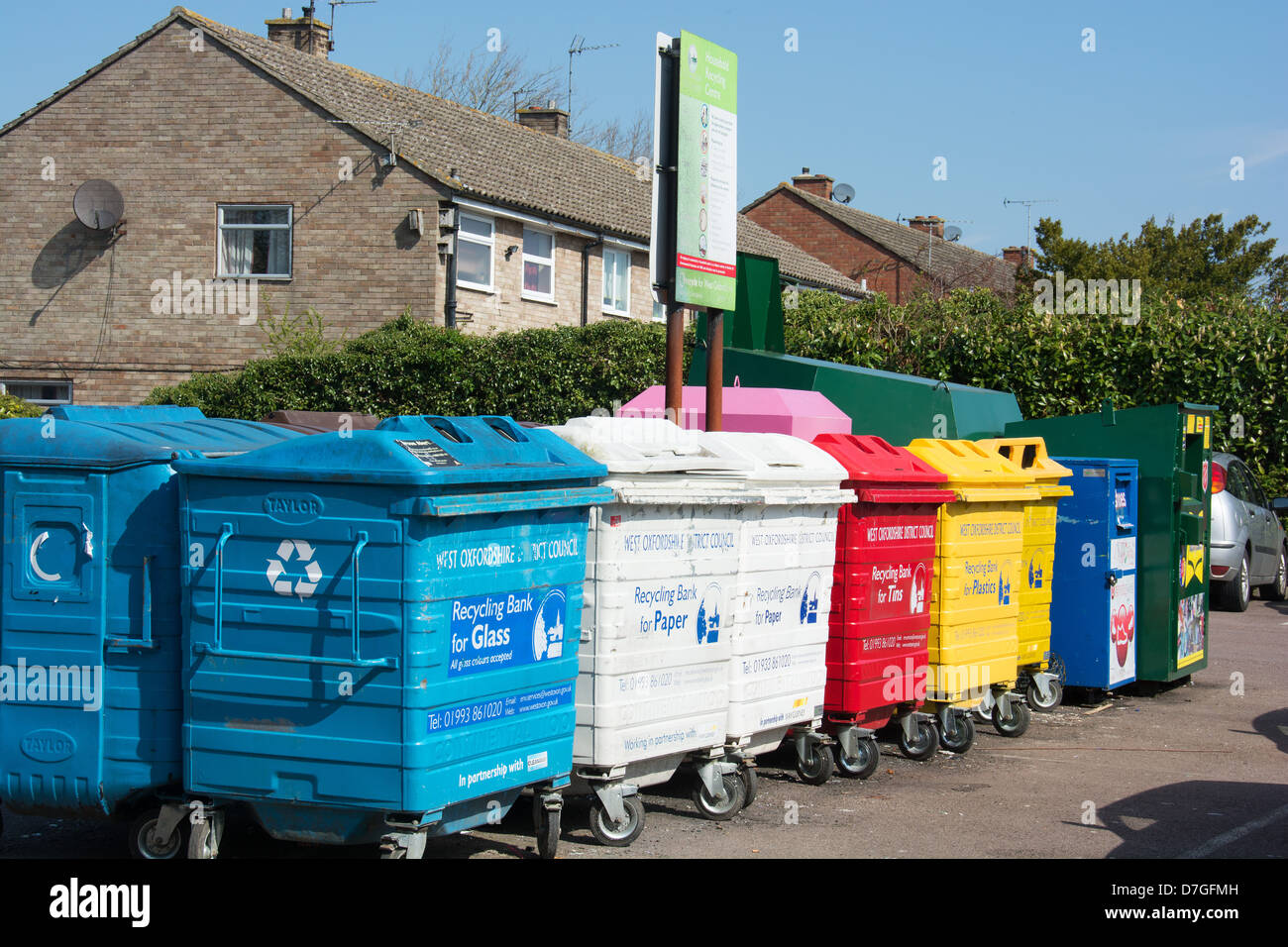 A public recycling bank, with colourcoded bins for different materials