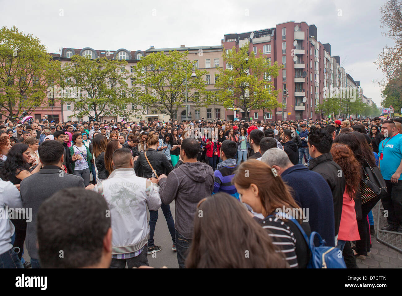 Turkish people dancing and celebrating Labor Day in Kreuzberg, Berlin Germany Stock Photo