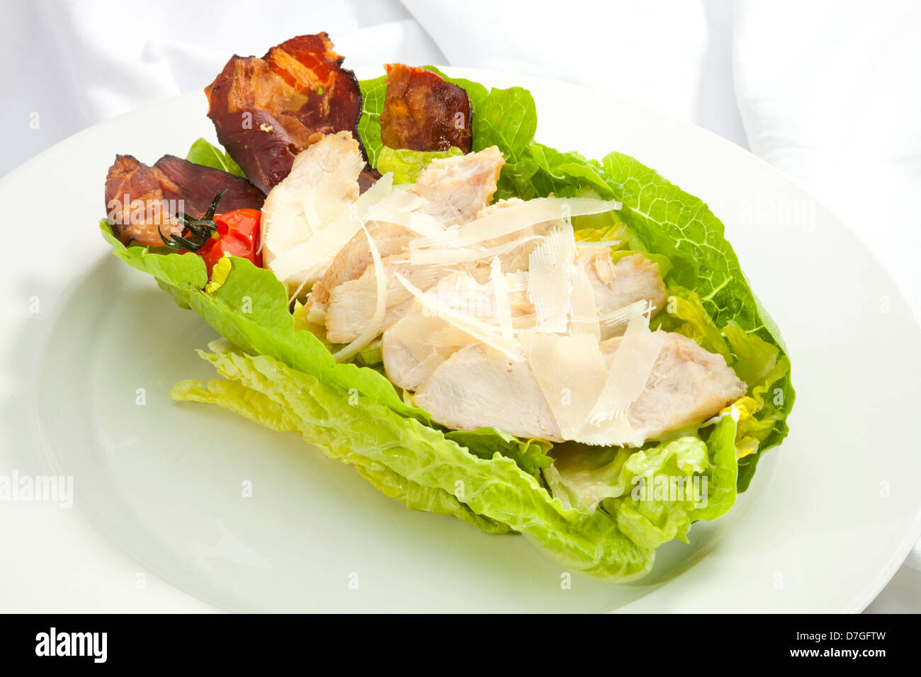 Salad Caesar with pieces of chicken and parmesan Stock Photo