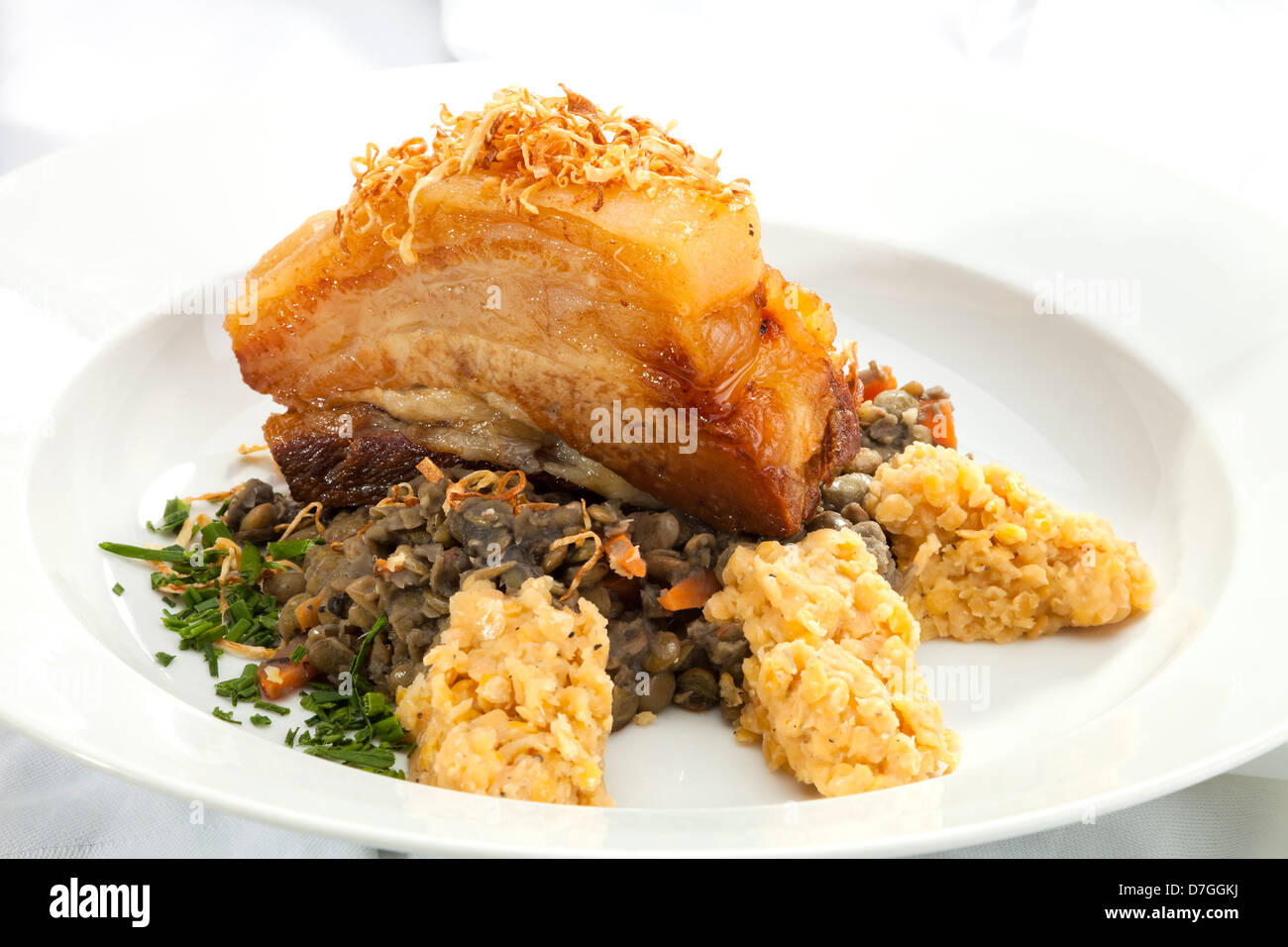 Baked Bacon with green and yellow lentil Stock Photo