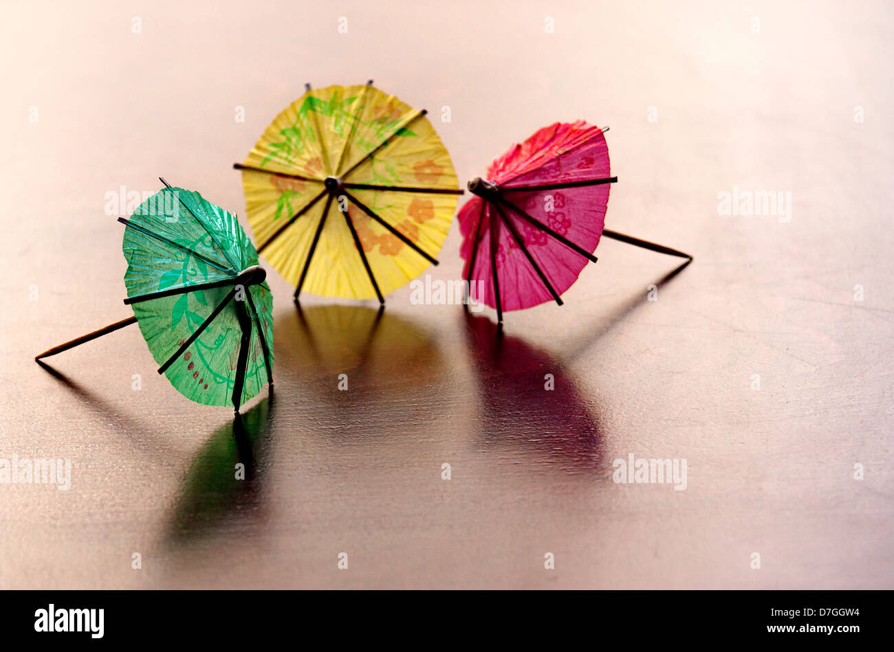Colorful cocktail umbrellas. Stock Photo